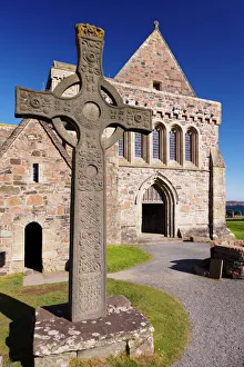 Replica of St. Johns cross stands proudly in front of Iona Abbey, Isle of Iona Replica of St. Johns cross stands proudly in front of Iona Abbey, Isle of Iona