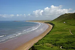 Rhossili Beach in spring morning sunshine, Gower Peninsula, County of Swansea Rhossili Beach in spring morning sunshine, Gower Peninsula, County of Swansea