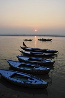 River Ganges (Ganga) at sunrise, Varanasi (Benares), Uttar Pradesh, India, Asia River Ganges (Ganga) at sunrise, Varanasi (Benares), Uttar Pradesh, India, Asia