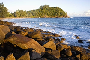 Rocky coast at sunset, Anse Bazarca, Takamaka district, Island of Mahe Rocky coast at sunset, Anse Bazarca, Takamaka district, Island of Mahe