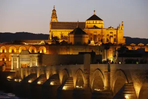 Roman bridge over the Rio Guadalquivir and Mezquita at dusk, UNESCO World Heritage Site Roman bridge over the Rio Guadalquivir and Mezquita at dusk, UNESCO World Heritage Site