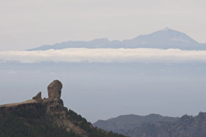 Roque Bentaiga and the volcano of El Teide in the background, Canary Islands Roque Bentaiga and the volcano of El Teide in the background, Canary Islands