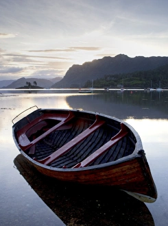 Rowing boat at low tide, dawn, Plokton, near Kyle of Lochalsh, Highland Rowing boat at low tide, dawn, Plokton, near Kyle of Lochalsh, Highland
