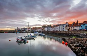 Sailing boats at sunset in the harbour at St. Monans, Fife, East Neuk, Scotland Sailing boats at sunset in the harbour at St. Monans, Fife, East Neuk, Scotland