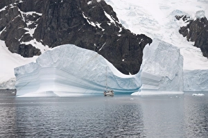 Sailing yacht and iceberg, Errera Channel, Antarctic Peninsula, Antarctica, Polar Regions Sailing yacht and iceberg, Errera Channel, Antarctic Peninsula, Antarctica, Polar Regions