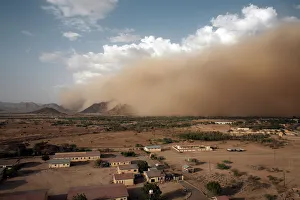 A sandstorm approaches the town of Teseney, near the Sudanese border, Eritrea, Africa A sandstorm approaches the town of Teseney, near the Sudanese border, Eritrea, Africa
