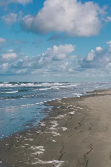 Sandy beach, blue sky and clouds, Schiermonnikoog, West Frisian Islands, Friesland, The Netherlands (Holland), Europe Sandy beach, blue sky and clouds, Schiermonnikoog, West Frisian Islands, Friesland, The Netherlands (Holland), Europe
