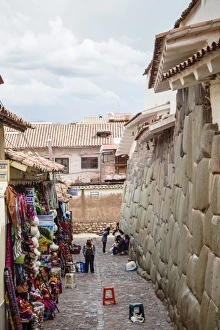 Shops along the the Inca wall at Hathunrumiyoq Street, las piedras del los 12 angulos (Stone of 12 Angles), Cuzco Shops along the the Inca wall at Hathunrumiyoq Street, las piedras del los 12 angulos (Stone of 12 Angles), Cuzco