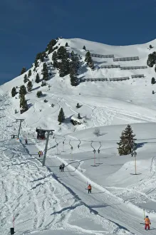 Skiers on ski lift, Mayrhofen ski resort, Zillertal Valley, Austrian Tyrol Skiers on ski lift, Mayrhofen ski resort, Zillertal Valley, Austrian Tyrol