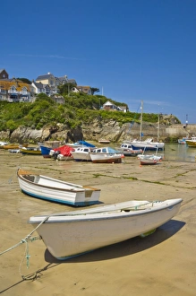 Small fishing boats and yachts at low tide, Newquay harbour, Newquay, Cornwall Small fishing boats and yachts at low tide, Newquay harbour, Newquay, Cornwall