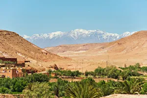 Snow capped High Atlas Mountains from Kasbah Ait Ben Haddou, near Ouarzazate, Morocco, North Africa, Africa Snow capped High Atlas Mountains from Kasbah Ait Ben Haddou, near Ouarzazate, Morocco, North Africa, Africa