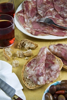 Soppressata (Soprassata) (Capofreddo), Italian dry-cured salami, Italian food Soppressata (Soprassata) (Capofreddo), Italian dry-cured salami, Italian food