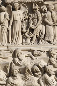 St. Michael weighing the souls and Resurrection of the Dead, Portal of the Last Judgement St. Michael weighing the souls and Resurrection of the Dead, Portal of the Last Judgement