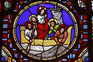 Stained glass of St. Peter fishing in Ainay Basilica, Lyon, Rhone, France, Europe Stained glass of St. Peter fishing in Ainay Basilica, Lyon, Rhone, France, Europe