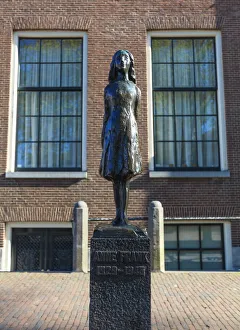 Prints of Statue of Anne Frank outside Westerkerk, near her house, Amsterdam, Netherlands, Europe Netherlands Prints: Statue of Anne Frank Print, Amsterdam Netherlands