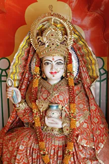 Statue of the Hindu goddess Annapurna (Parvati) giving food, Lakshman temple Statue of the Hindu goddess Annapurna (Parvati) giving food, Lakshman temple
