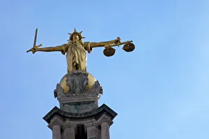 Statue of Lady Justice with sword, scales and blindfold, Old Bailey, Central Criminal Court, London, England Statue of Lady Justice with sword, scales and blindfold, Old Bailey, Central Criminal Court, London, England