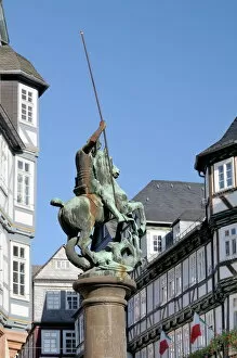 Images Dated 18th October 2009: Statue of St. George slaying the dragon, Market Square, Marburg, Hesse, Germany, Europe