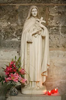 Statue of St. Therese de Lisieux, Semur-en-Auxois, Cote d'Or, Burgundy, France, Europe Statue of St. Therese de Lisieux, Semur-en-Auxois, Cote d'Or, Burgundy, France, Europe