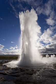 Strokkur (the Churn) which spouts up to 35 meters erupting Strokkur (the Churn) which spouts up to 35 meters erupting