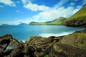 Stunning coastal scenery with the Vagafjordur and Streymoy Island in the background Stunning coastal scenery with the Vagafjordur and Streymoy Island in the background