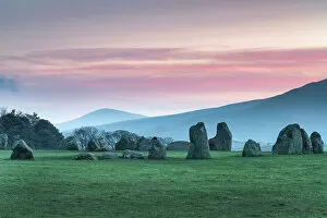 Images Dated 14th November 2022: Sunrise over Castlerigg and St. John's in the Vale near Keswick, Lake District National Park