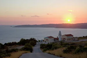 Sunset over Lourdata Bay, monastery prominent, near Lourdata, Kefalonia (Kefallonia, Cephalonia), Ionian Islands Sunset over Lourdata Bay, monastery prominent, near Lourdata, Kefalonia (Kefallonia, Cephalonia), Ionian Islands