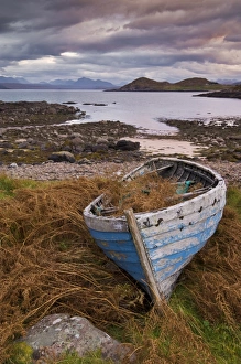 Sunset, old blue fishing boat, Inverasdale, Loch Ewe, Wester Ross, north west Scotland Sunset, old blue fishing boat, Inverasdale, Loch Ewe, Wester Ross, north west Scotland