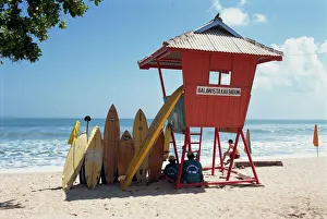 Surfboards stacked waiting for hire at Kuta beach on Surfboards stacked waiting for hire at Kuta beach on