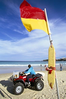 Swimming flag and patrolling lifeguard at Bondi Beach, Sydney, New South Wales Swimming flag and patrolling lifeguard at Bondi Beach, Sydney, New South Wales
