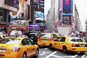 Taxis and traffic in Times Square, Manhattan, New York City, New York, United States of America Taxis and traffic in Times Square, Manhattan, New York City, New York, United States of America