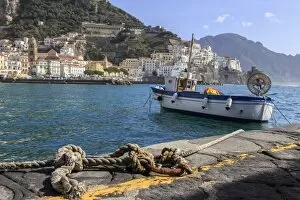 Amalfi Harbour Collection: Tethered fishing boat with rope, Amalfi harbour, from quayside with view towards Amalfi town