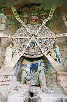 Tibetan Buddhist wheel of life rock sculpture at Dazu Rock Carvings, UNESCO World Heritage Site Tibetan Buddhist wheel of life rock sculpture at Dazu Rock Carvings, UNESCO World Heritage Site