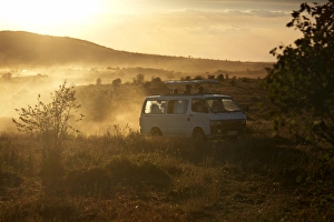 Tourists on safari in the Masai Mara National Reserve, Kenya, East Africa, Africa Tourists on safari in the Masai Mara National Reserve, Kenya, East Africa, Africa
