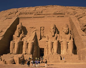 Tourists in front of the Temple of Re-Herakhte, built for Ramses II, also known as the Sun or Great Temple of Ramses II, Abu Simbel, UNESCO World Heritage Site, Nubia, Egypt, North Tourists in front of the Temple of Re-Herakhte, built for Ramses II, also known as the Sun or Great Temple of Ramses II, Abu Simbel, UNESCO World Heritage Site, Nubia, Egypt, North