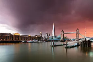 Images Dated 11th November 2021: Tower Bridge and The Shard at sunset with storm clouds, London, England, United Kingdom