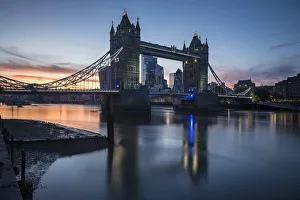 London Skyline At Sunset Prints: Tower Bridge at sunset reflected in the River Thames, London, England, United Kingdom