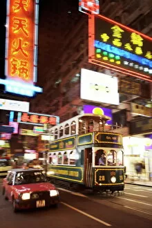 Related Images Collection: Tram and taxi with neon lights, Hong Kong, China, Asia