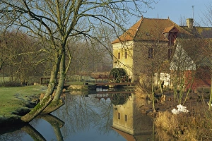 Tranquil scene of watermill reflected in still water, near Montreuil in the Crequois Tranquil scene of watermill reflected in still water, near Montreuil in the Crequois