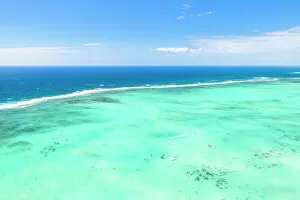 Africa Collection: Turquoise coral reef meeting the blue Indian Ocean, aerial view by drone, Ile Aux Cerfs