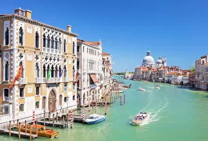 Vaporettos passing Palazzo Cavalli-Franchetti and the Santa Maria della Salute on the Grand Canal Vaporettos passing Palazzo Cavalli-Franchetti and the Santa Maria della Salute on the Grand Canal