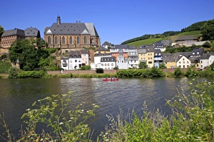 View towards Church of St. Lawrence in Saarburg on River Saar, Rhineland-Palatinate View towards Church of St. Lawrence in Saarburg on River Saar, Rhineland-Palatinate
