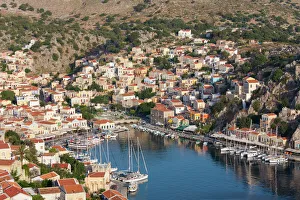 View over the colourful harbour, Gialos (Yialos), Symi (Simi), Rhodes, Dodecanese Islands View over the colourful harbour, Gialos (Yialos), Symi (Simi), Rhodes, Dodecanese Islands