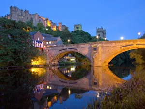 View to the illuminated castle and cathedral across the River Wear below Framwellgate Bridge View to the illuminated castle and cathedral across the River Wear below Framwellgate Bridge