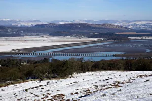 View of Lakeland fells and Kent estuary from Arnside Knott in snow, Cumbria View of Lakeland fells and Kent estuary from Arnside Knott in snow, Cumbria