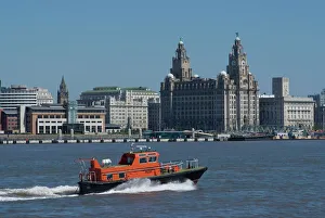Prints of View of the Liverpool skyline and the Liver building, with a pilot boat in the foreground, taken from the Mersey ferry, Liverpool, Merseyside, England, United Kingdom, Europe Related Prints: View of Liverpool Skyline Print, Mersey Ferry