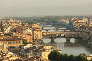 View of the medieval city of Florence with the typical Ponte Vecchio on Arno River View of the medieval city of Florence with the typical Ponte Vecchio on Arno River