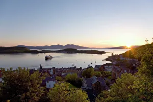 View over Oban Bay from McCaigs Tower, sunset, ferry coming into port, Oban View over Oban Bay from McCaigs Tower, sunset, ferry coming into port, Oban