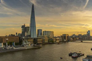View of The Shard, HMS Belfast and River Thames from Cheval Three Quays at sunset, London View of The Shard, HMS Belfast and River Thames from Cheval Three Quays at sunset, London