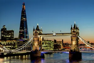 View of the Shard and Tower Bridge standing tall above the River Thames at dusk, London, England, United Kingdom View of the Shard and Tower Bridge standing tall above the River Thames at dusk, London, England, United Kingdom